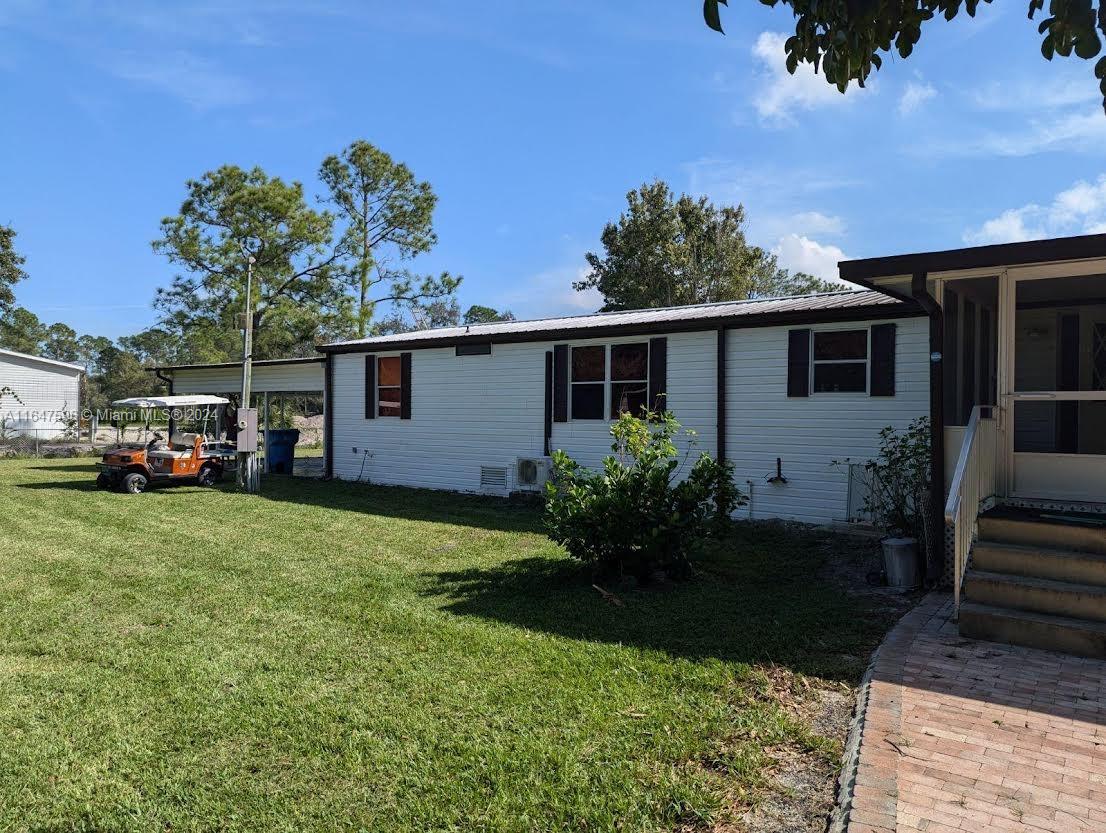 1.25 Acres of Land ready to move! Perfectly located un the center of Montura Ranches>. 3 bedrooms and 2 bathrooms Mobile Home Remodeled, Water System, Sprinkle System, Electric System inside the house to connect a generator. Smoke BBQ. New Brand A/C - New Laminated flooring - Remodel All plumbing, electrical - Metal roof. Dryer and Washer brand new - New refrigerator. Come and take a look at all this property is offering !!!