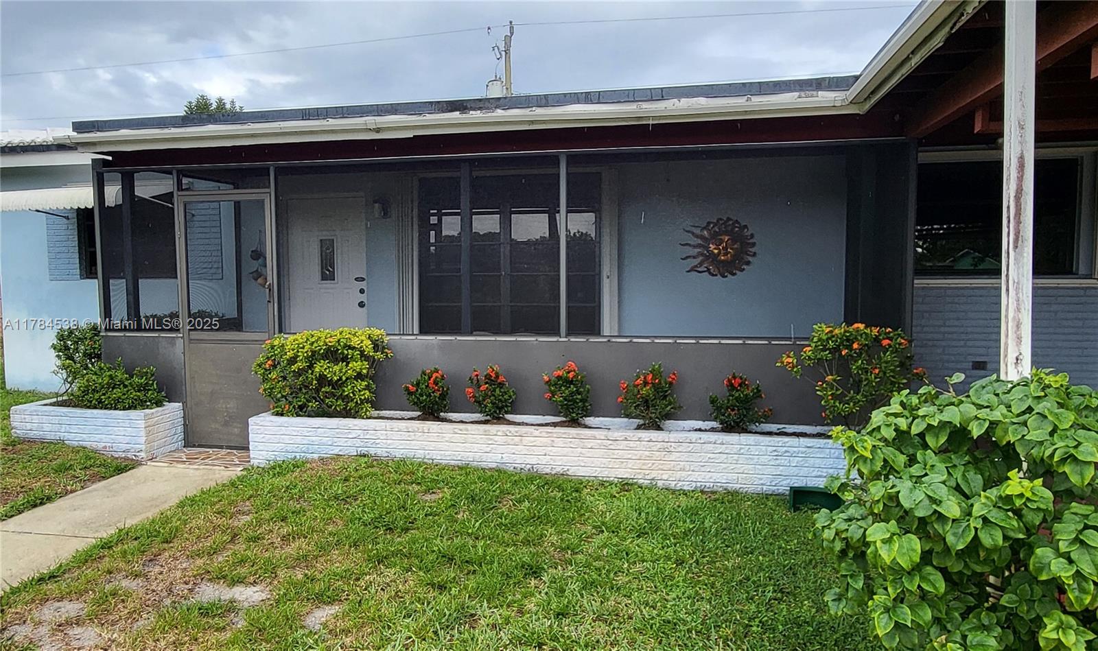 Price reduction, Open House, August 9th & 10th, 1-4. This exceptional home features three spacious bedrooms, one bathroom, and a carport. Enjoy two screened-in patios (front & back), perfect for savoring morning coffee or unwinding in the evening. An air-conditioned room offers versatility as a fourth bedroom, office, or game room. With a gas stove and water heater, it’s both efficient and functional. Located near Hollywood Beach, shopping, schools, and parks, it’s just minutes from the Hardrock Casino Resort and Hardrock Stadium.
