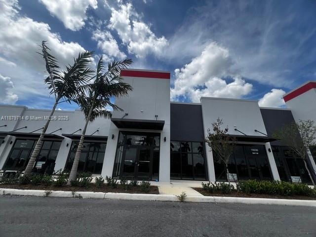 Brand new construction right on NW 27th Ave within walking distance of the Hard Rock Stadium. Featuring Xfinity, Verizon, Smoothie King, PNC Bank, Einstein Bagels, Players Barber Shop, Juicy Patty, and many more. Plenty of on-site parking with strong visibility. This center has finally been completed, and all tenants are now building out and preparing to open. One unit available, Unit 4, which is 1270 Sf $5,926.00 per month
