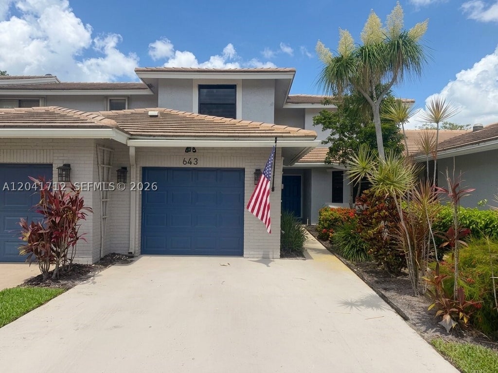 Photo of 643 Deer Creek North Shore Dr, Deerfield Beach, FL 33442 (MLS # A12041712)