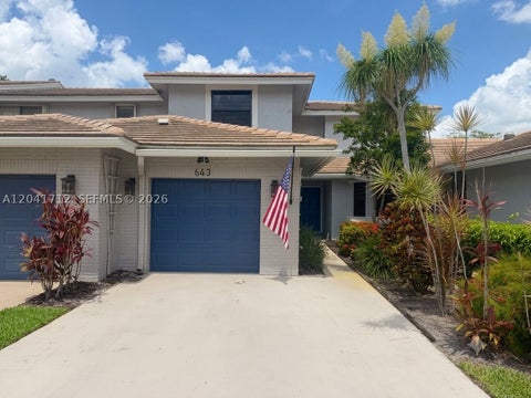 Photo of 643 Deer Creek North Shore Dr, Deerfield Beach, FL 33442 (MLS # A12041712)