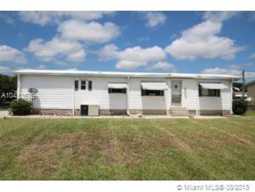LAKE OKEECHOBEE ACCESS - TAYLOR CREEK ISLE - Power has been updated, New kitchen cabinet - solid wood, Master bedroom parkway wood floors, laminate throughout, boat ramp, 2015 new A/C with all new duct work, Metal roof 2007, shed, good canal. Separate bedroom suite with bathroom and sitting room with own door. Boat Dock needs some TLC.