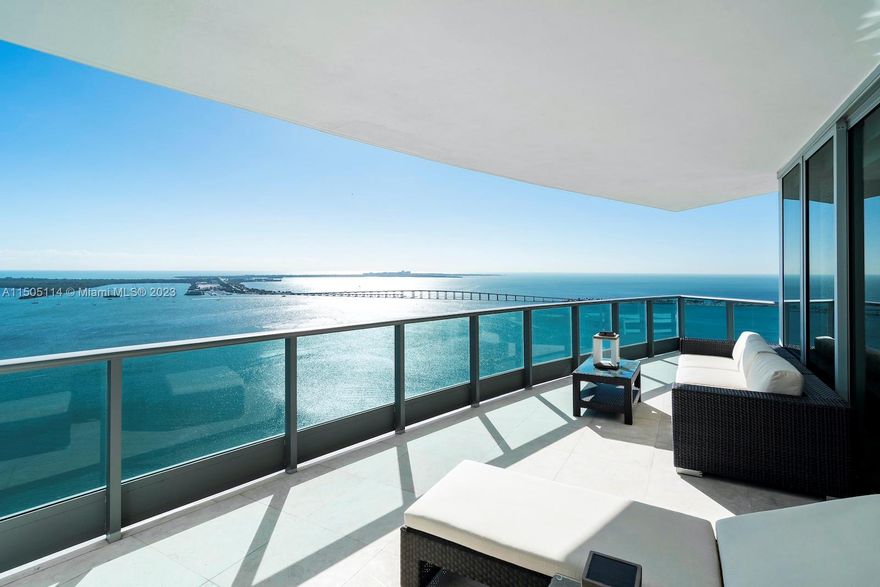 This is the one you've been waiting for! Breathtaking, panoramic bay and ocean views from sought-after south east to west flow through. Private elevator opens to 3,400+SF of stunning water views at every turn and 3 balconies-800+SF of outdoor space. No luxury was spared when redesigning this spectacular home. Unique features and upgrades include onyx marble bar, theater room with 100'' screen, Crestron home automation system, motorized window treatments, venetian plaster walls and more. Unit includes storage and 3 assigned parking spaces. Jade is one of Miami's premier waterfront luxury high-rises offering 5-star amenities and steps away from world-class dining, entertainment and shopping.
