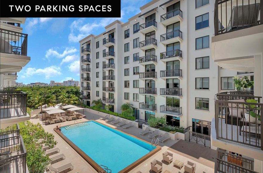Welcome to the newest neighborhood in Coral Gables – trendy and very walkable! Immediate walking access to Trader Joes, restaurants, and all the amenities within the trendy Village of Merrick Park. Easy access to US-1 and Metro Rail for your commute.  This FURNISHED unit features the best views within Merrick Manor - overlooking pool with a nice vista of downtown Coral Gables in the distance! 2 parking spaces convey with the unit.  Impeccably finished and maintained condo features walk-in closets, two-tone Italikraft cabinetry, Bosch appliances, Nest A/C thermostat and quartz counters.  Merrick Manor features top amenities included in photos with a saline-filtered heated pool, summer kitchen, fitness center, valet services and 24-hour concierge/security.