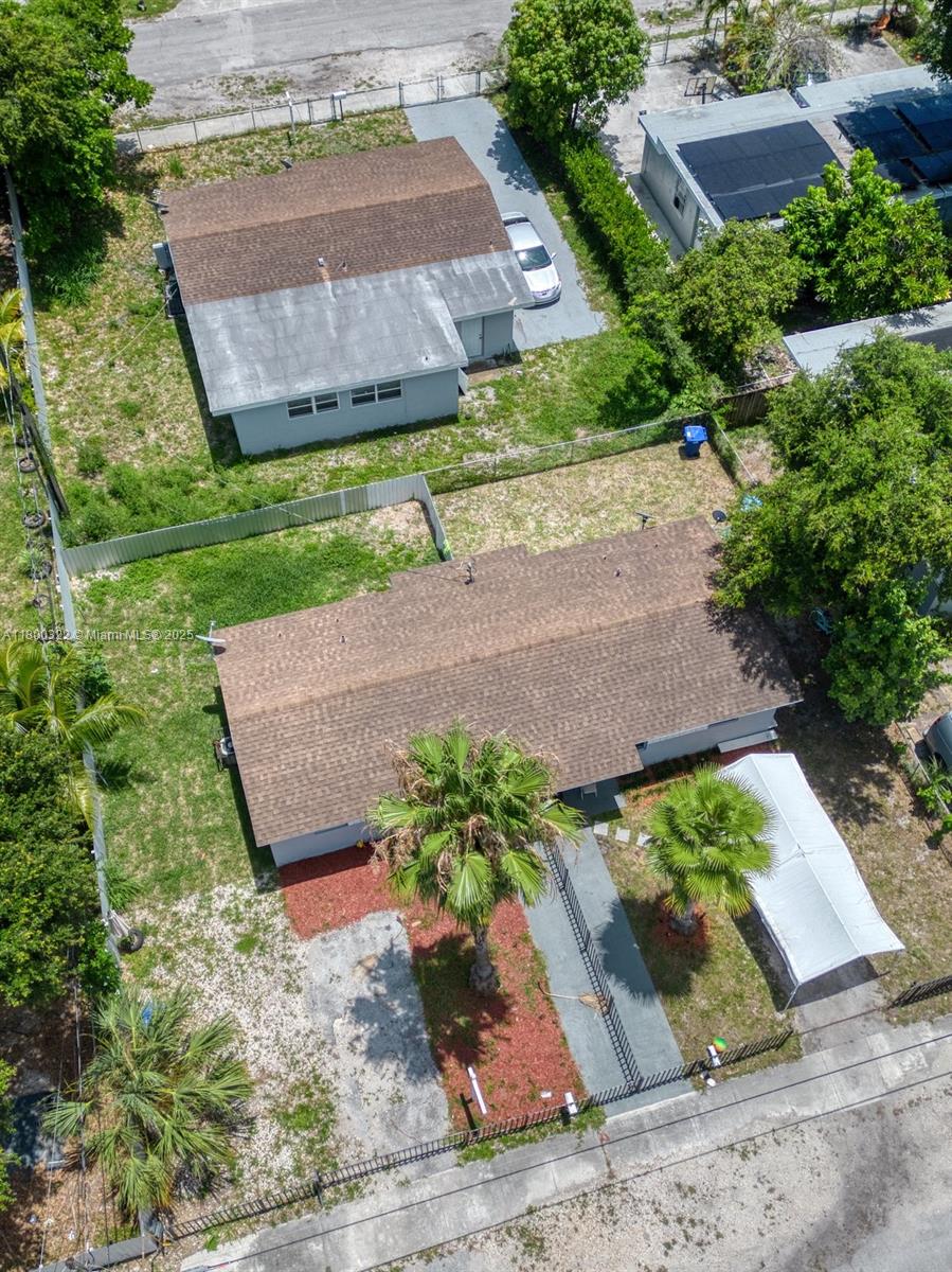 Motivated Seller, Discover this fantastic opportunity in the heart of Miami, centrally located near bus hubs, stores, and schools. This unique property includes both a single-family home and a duplex,making it ideal for investment or multi-generational living.Property Details include a Single Family Home: 3 Bedrooms, 2 Bathrooms Duplex: 1 Bedroom, 1 Bathroom (perfect for rental income 1 already rented) Recently Renovated Featuring modern laminated flooring and fresh updates throughout.Large Backyard,Perfect for outdoor activities, gardening, or entertaining. Investment Located in an Opportunity Zone with Miami-Dade Special Qualifications, this property offers great potential for appreciation and development. Note:Both properties must be sold together.