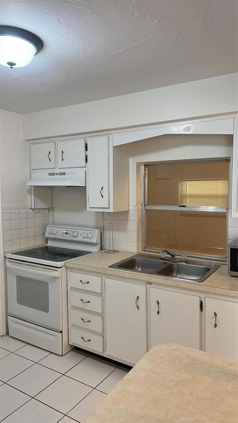 Tiny photo for 2420 NW 64th Ter, Sunrise, FL 33313 (MLS # A12026729)