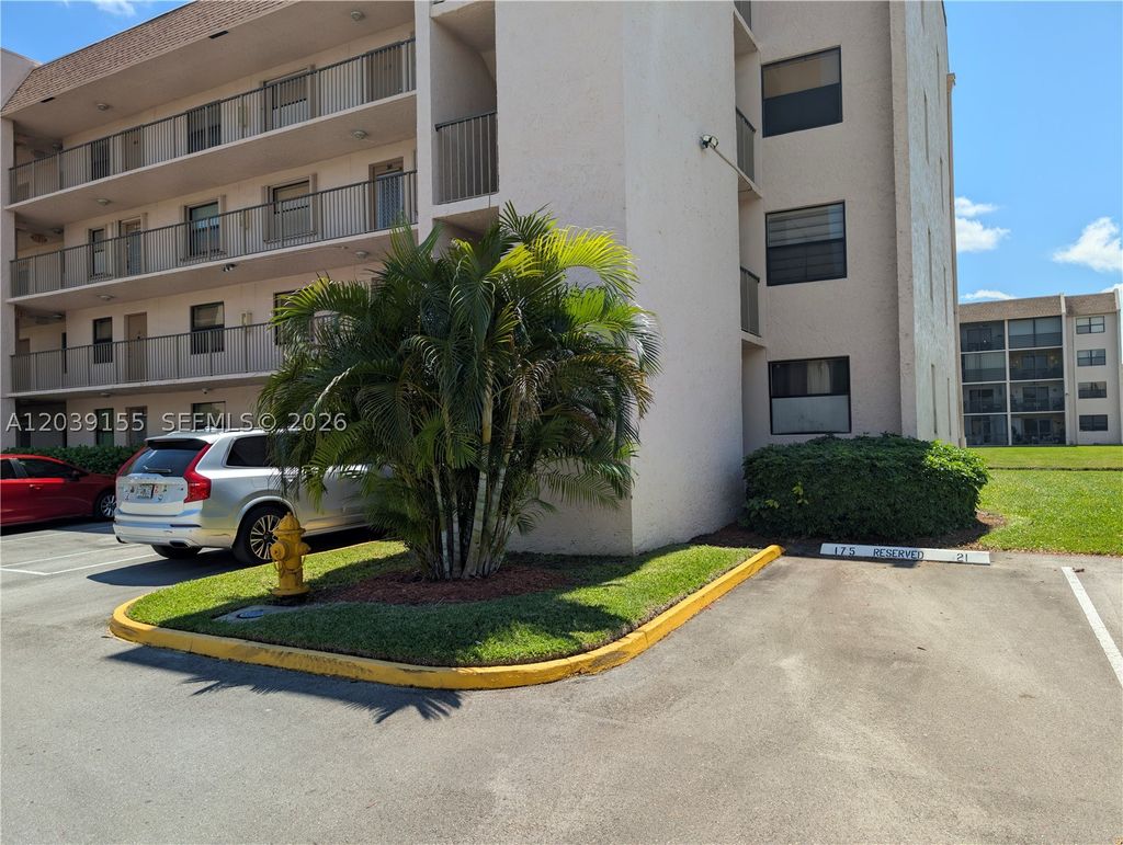 Photo of 10120 Sunrise Lakes Blvd #110, Sunrise, FL 33322 (MLS # A12039155)