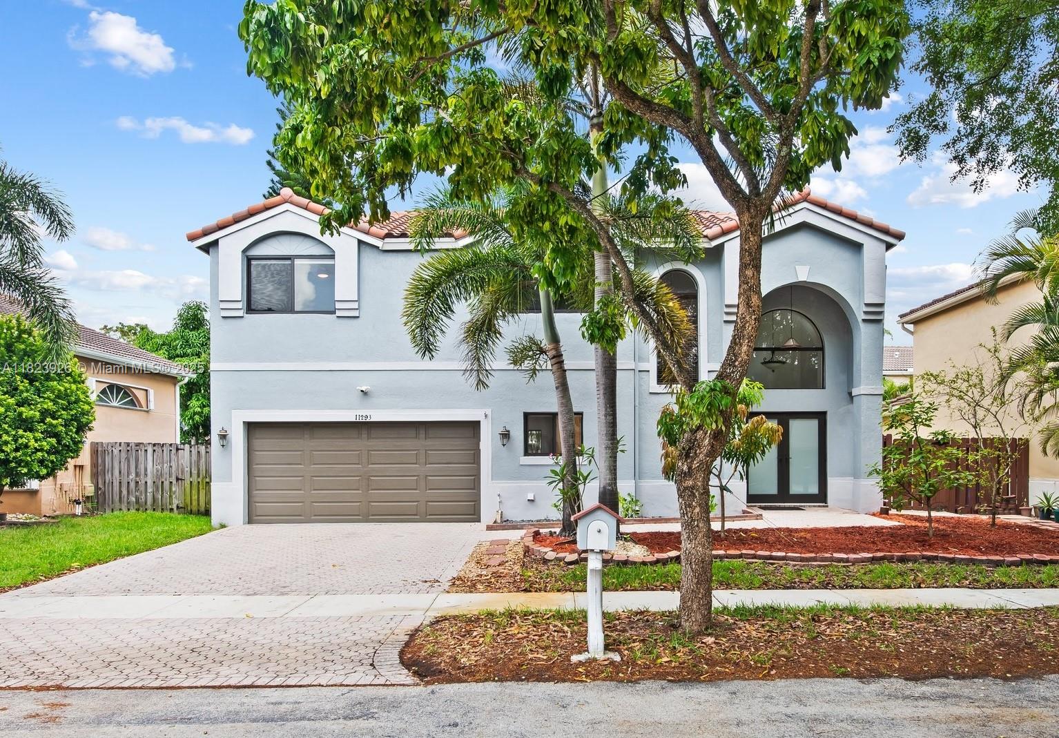 Remarkable 4 bedroom, 2.5 bathroom, 2-car garage family home in the highly desirable gated REFLECTIONS at ROCK CREEK community in Cooper City. FULL IMPACT WINDOWS AND DOORS (2022), ROOF (2022), AC (2018), WATER HEATER (2021). First floor updated tile & Brazilian hardwood floors upstairs. Features include: hardwood kitchen cabinets and quartz countertops, brand new dry bar, updated primary bathroom w/ bidet, newer appliances, entirely paved patio, freshly painted exterior, fenced backyard, fruit trees, well water for irrigation/sprinklers, Nest smart thermostat and garage floodlights. A+++ Schools, pet friendly community, 2.75 mile jog/walk path, parks, lakes, sports courts, tot playgrounds, tree-lined streets, community pool. Access to lap pool and tennis center.