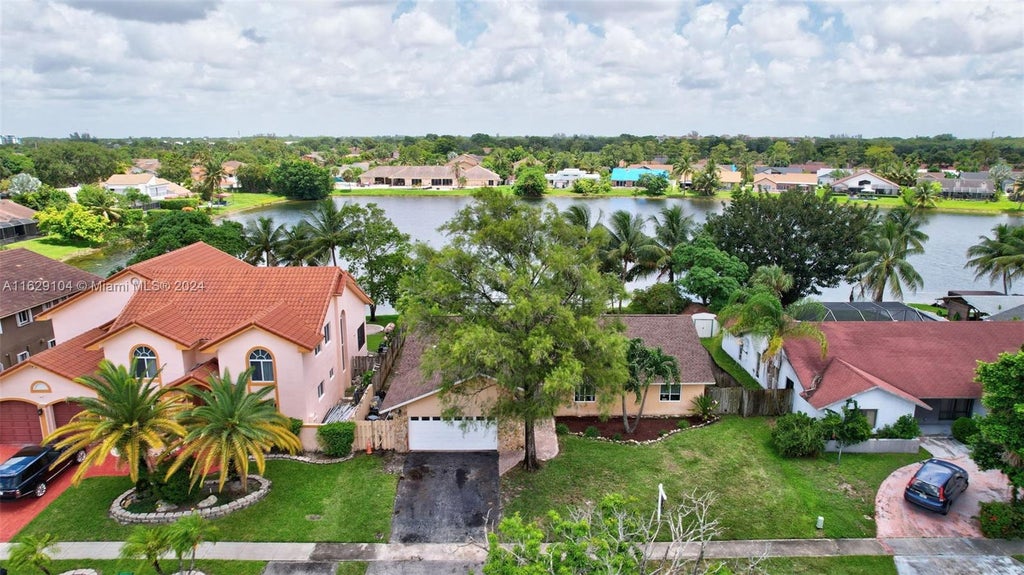 Photo of 7231 NW 47th Pl, Lauderhill, FL 33319 (MLS # A11629104)