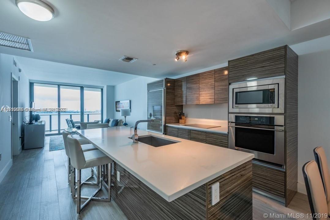 Stunning fully furnished 2 Bed/2Bath condo with pen, unobstructed & breathtaking views of Biscayne Bay & South Beach in the hottest area of Miami, Edgewater. Unit is steps away from Design District, Midtown Shops and a 5 minute drive to Wynwood and the art district as well as right next to 95. Porcelain floors, beautiful amenities such as heated pool, tennis courts, exercise room, sauna/spa, and a park where you can walk your dog/ exercise conveniently.