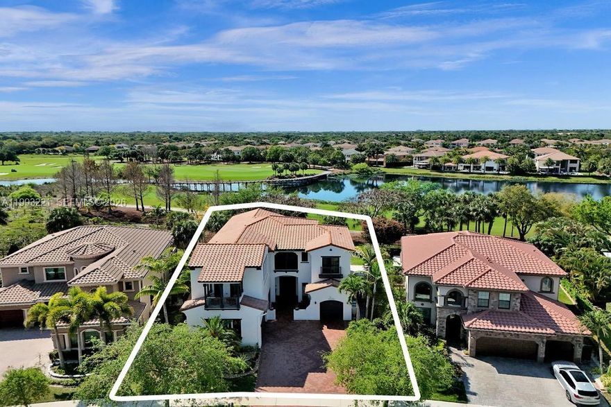 Not every address is equal. Parkland Golf & Country Club sets the standard. Parkland's only private golf community. 790 gated acres. A Greg Norman-designed championship course. A 43,000 sq ft sports club. And a lifestyle that is simply unavailable anywhere else in the city. This 5BR/4.5BA estate opens to golf, lake, and bridge views, a panorama that defines the living experience from day one. Inside: a remodeled kitchen with waterfall quartz and custom cabinetry, an updated primary bath, a private office with dual built-ins and a separate entrance and an open loft with dual work zones. Every detail has a purpose.
Outside, a heated saltwater pool, outdoor kitchen, covered patio, and cabana bath create an effortless extension of the home. Impact windows, wood front door, 3-car garage with built-in storage and generator.
Behind the guard-gated entry: private on-site restaurant and bar, Har-Tru tennis, pickleball, resort pools, spa, fitness center, kids club, and year-round events. Dinner reservations start at your front door. Located between Boca Raton and Fort Lauderdale, Parkland, FL. Zoned for A-rated Park Trails Elementary, Westglades Middle, and Marjory Stoneman Douglas High School.
This is what private club living looks like.