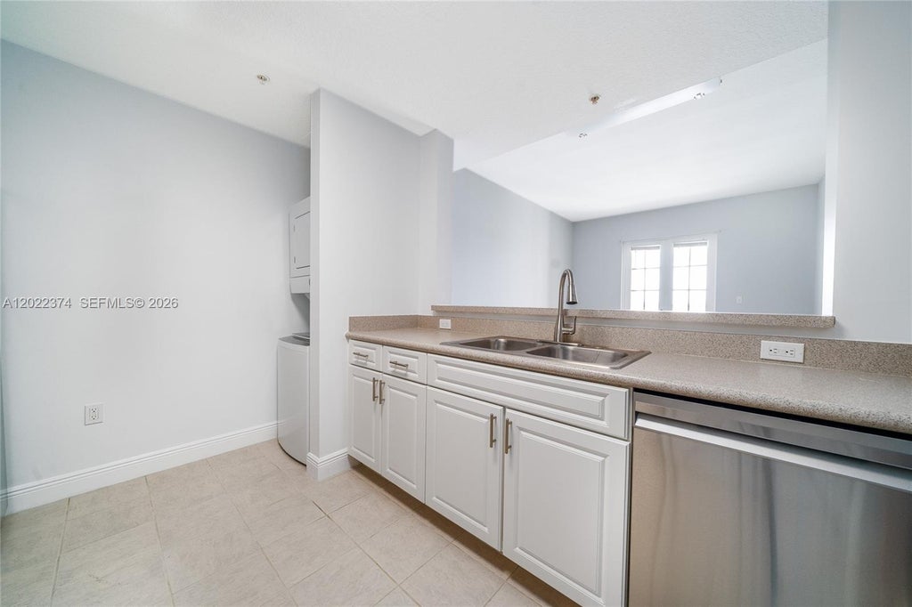 Photo of 1200 Town Center Dr #513, Jupiter, FL 33458 (MLS # A12022374)