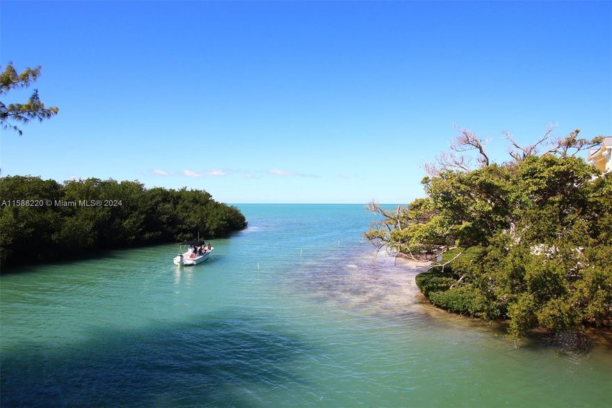 Single Family home on a canal with partial open water views