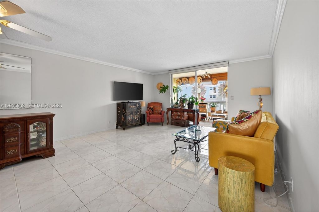 Photo of 610 NE 12th Ave #602, Hallandale Beach, FL 33009 (MLS # A12005802)