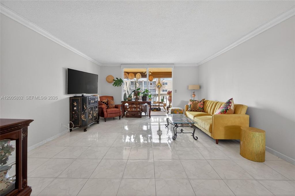 Photo of 610 NE 12th Ave #602, Hallandale Beach, FL 33009 (MLS # A12005802)