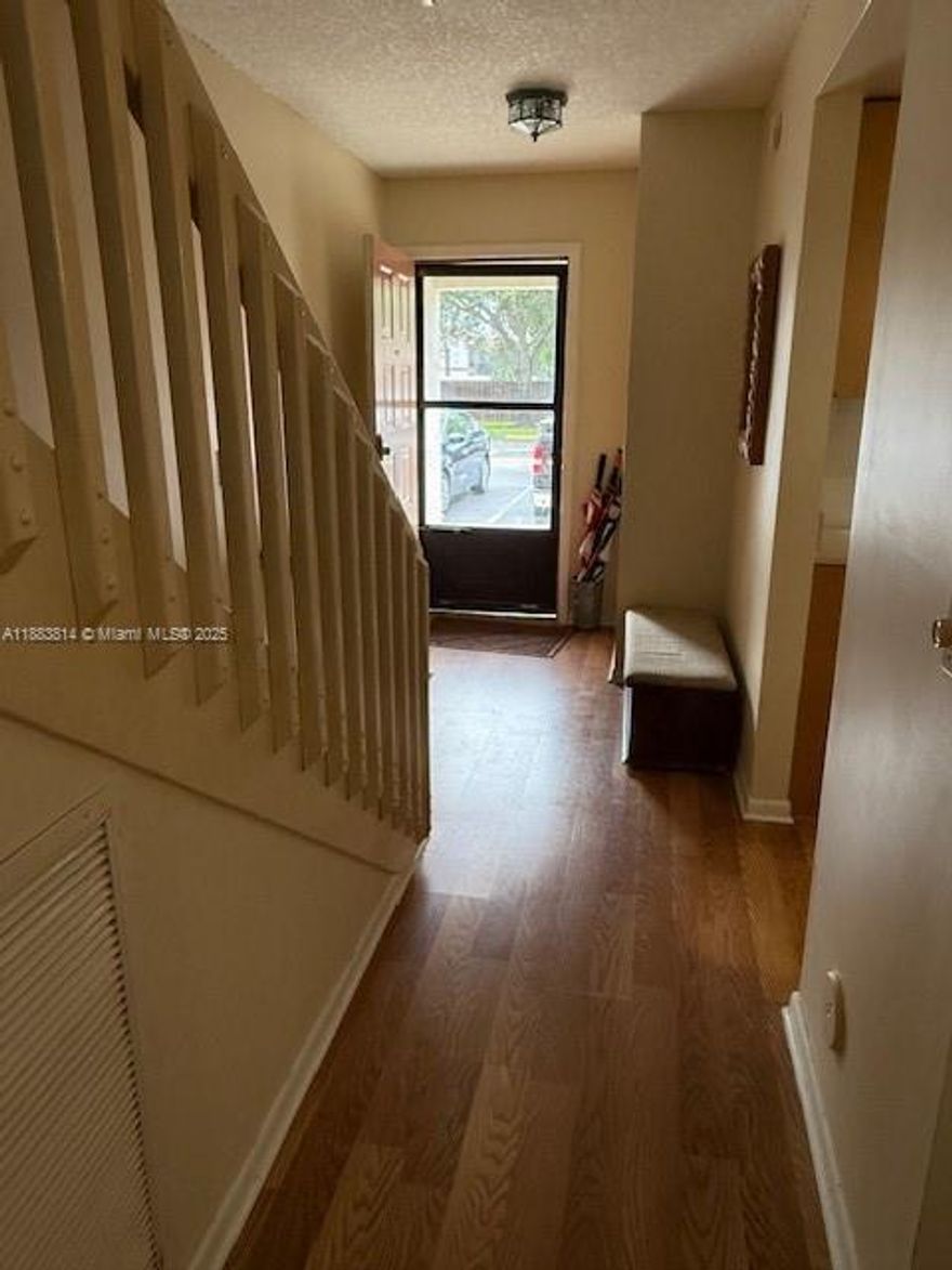 2 Bedroom 1 1/2 Bathroom pet friendly townhouse near the NSU/College district with a community pool, child playground, in beautiful Davie. A perfect starter for FHA BUYERS or INVESTORS near NSU college district!  New hot water heater, A/C 2024, updated bath fitter bathroom, laminate floors, knockdown ceilings, soft close cabinets with pullouts and Ceasar stone countertops, accordian hurricane shutters. Screened Patio with lots of green space for BBQ and kids/pets to play and it's conveniently located next to the pool.