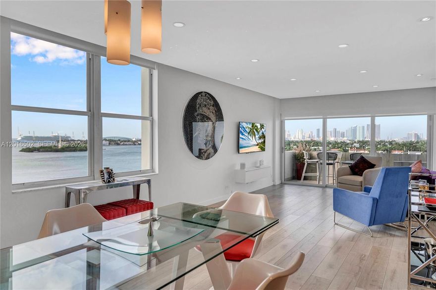 Live in the most desirable line at 3 Island Avenue. This beautiful corner unit redefines luxury with its breathtaking views of Biscayne Bay and the Miami skyline. Immerse yourself in a world of contemporary design and lavish renovations. The open-concept living area seamlessly integrates sleek finishes, creating a space that complements the panoramic bay and skyline views from the corner balcony. The master bedroom offers breathtaking views, & a modern Bathroom with a walk in closet. The kitchen features top-of-the-line appliances, & custom Scavolini cabinetry. Located on beautiful Belle Isle, this address grants easy access to South Beach, fine dining, high-end shopping, & cultural experiences. The unobstructed bay and skyline views make this unit a rare gem in the luxury market.