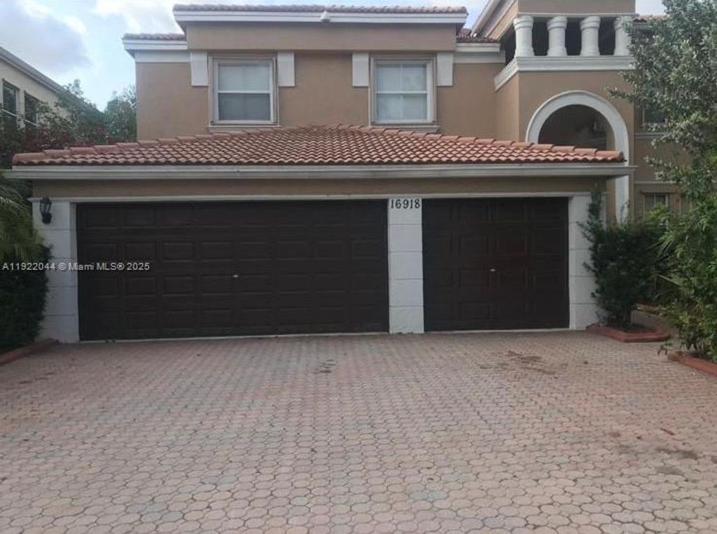 Photo of 16918 SW 16th St, Pembroke Pines, FL 33027 (MLS # A11922044)