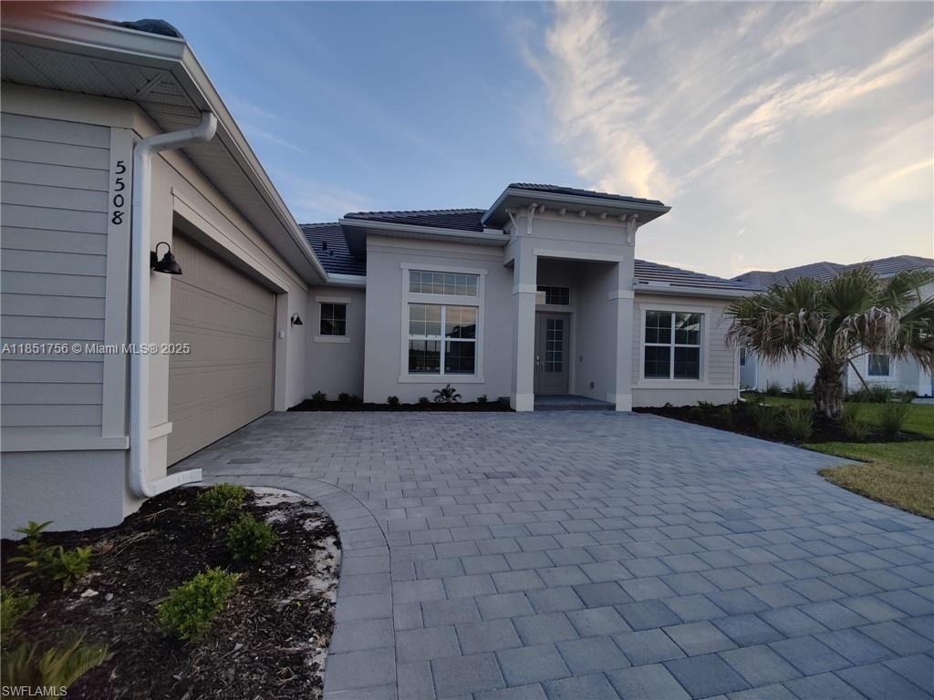 This stunning Lakeside model home featuring panoramic lake and golf course views. Built in 2023, this meticulously maintained property offers 3 spacious bedrooms + den, 3 full bathrooms, and nearly 2,700 sq ft of elegant living space. Step outside to a covered lanai and spacious backyard with plenty of room to build the pool of your dreams. This home includes social membership to the prestigious Gordon Lewis-designed championship golf course, clubhouse, resort-style pool, fitness center, dining, and more. Located in the vibrant and growing town of Ave Maria, just minutes from parks, schools, and shopping. Don't miss the opportunity to own a move-in-ready home in one of Southwest Florida’s most desirable gated communities!