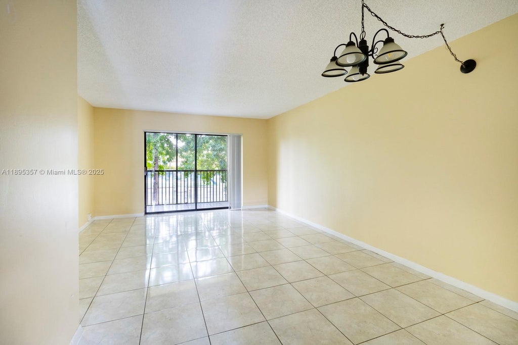 Photo of 9022 NW 28th Dr #2-209, Coral Springs, FL 33065 (MLS # A11895357)