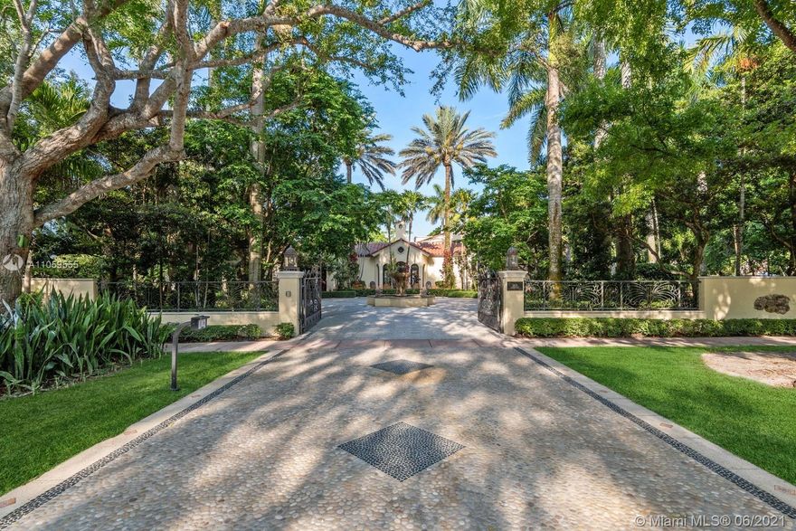 Spectacular Property Heart of Historical Coral Gables! Masterpiece with intricate layers attention to details.  Stainless Glass, iron work, wood beams. Corner lot 26,375 SF. Gated West Granada entrance circular mosaic stone driveway fountain. Gated South entrance driveway & garage. Breathtaking Gardens. Coral Rock Grotto, two Koi ponds & waterfall. Lighting, Generator, Loggia, Pool, Gazebo  & BBQ. Interior STUNNING! Six Bedrooms five Bathrooms two Half Baths & Gallery. High ceilings, ceiling wood beams, two fireplaces, Venetian Plaster & textured paint through out, wood arches mosaic tiles. Basement movie theatre & wine cellar. Walk to Historical Biltmore Hotel Golf & Tennis, Venetian Pool, Miracle Mile, Granada Golf Course, De Soto Fountain. Amazing Elements make this a Blissful Property!