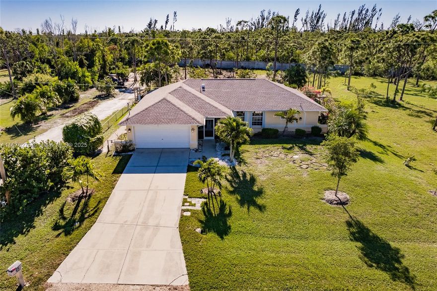 Seller to buyer concession of $10K. New Roof in 2022. A 3-bedroom, 2-bathroom house on 1.04 acres with a pool and a 2-car garage in Pine Island, situated off the coast of Cape Coral. This idyllic location offers an incredible opportunity to immerse yourself in the beauty of nature, while still enjoying all the comforts of a modern home. With its breathtaking views and mesmerizing sunsets, Pine Island provides an oasis-like setting that is sure to leave you in awe. The spacious 3-bedroom house is perfect for families, offering ample space for everyone. The highlight of this house is undoubtedly the pool, where you can cool off and enjoy the warm Florida sun to your heart's content. Space to park a boat and RV, gravel driveway extends to the back of the property.