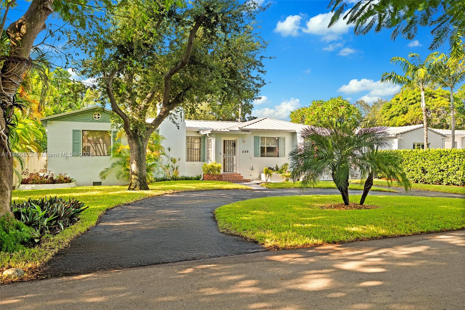 Welcome to Casa Poinciana, a gem in the heart of historic Morningside—where timeless charm meets Miami lifestyle. This 3-bed, 2-bath residence has been lovingly maintained, preserving its essence while incorporating major updates. Original wood floors remain well kept, while a 2022 metal roof, updated PVC plumbing, a modern kitchen with S/S appliances, and travertine tiles in the family area add comfort and character. The home radiates classic charm with arched doorways, warm accents, and an enclosed terrace w/ jacuzzi overlooking private backyard views. Additional highlights include a 1-car garage and an 8,250 sq. ft. lot. Located near Cushman, DASH, & Miami Country Day schools, and minutes from the airport, beaches, Design District, Midtown, Wynwood, dining, arts, and Downtown/Brickell.