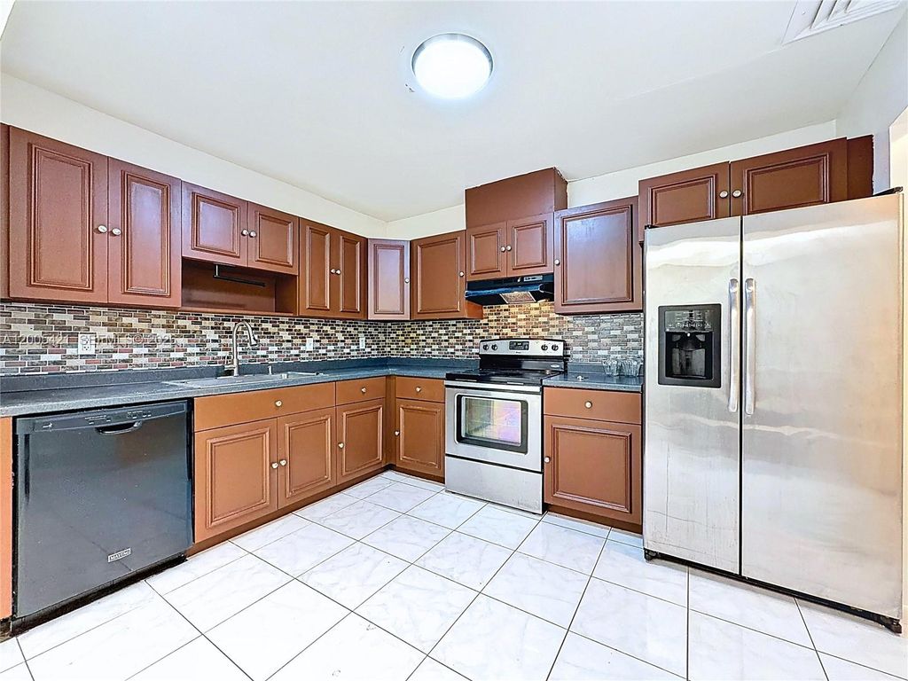Photo of 8900 W Sample Rd #202, Coral Springs, FL 33065 (MLS # A12005421)
