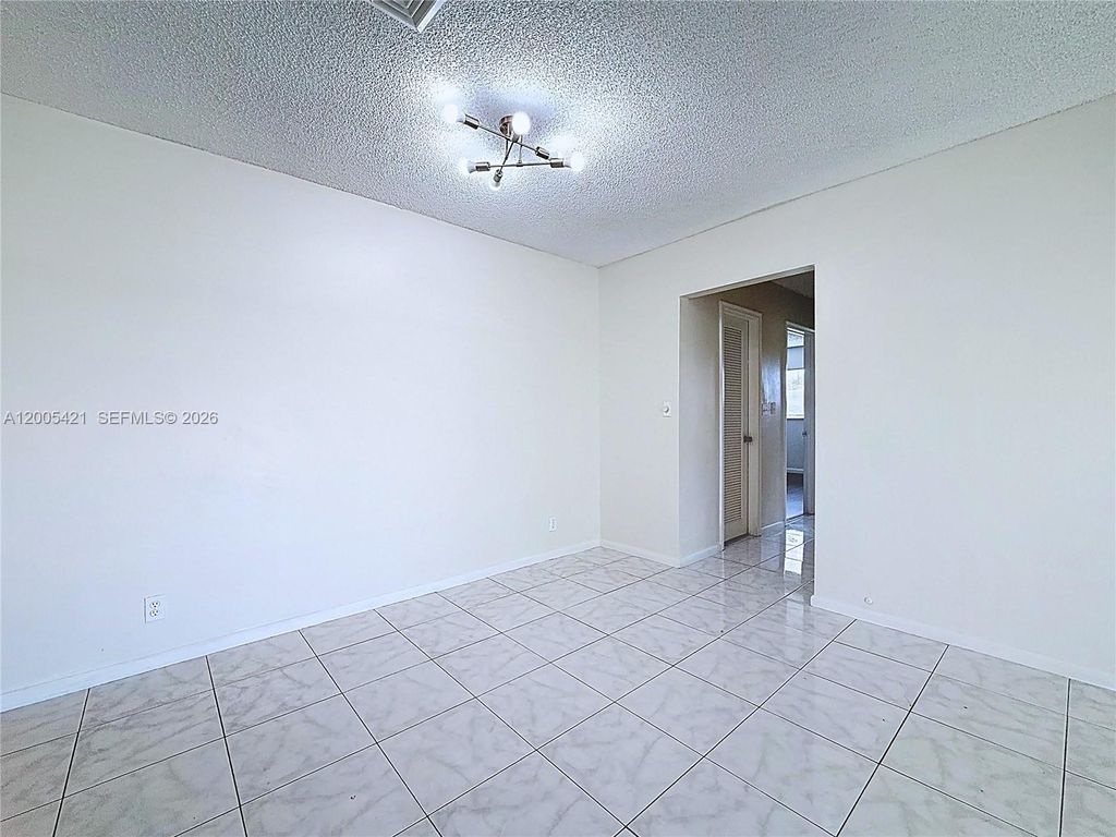 Photo of 8900 W Sample Rd #202, Coral Springs, FL 33065 (MLS # A12005421)