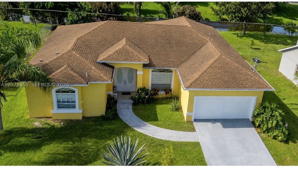 Photo of 232 SW Carter Ave, Port St Lucie, FL 34983 (MLS # A12072358)