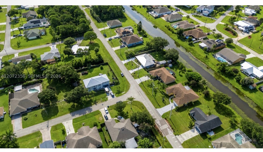 Photo of 232 SW Carter Ave, Port St Lucie, FL 34983 (MLS # A12072358)