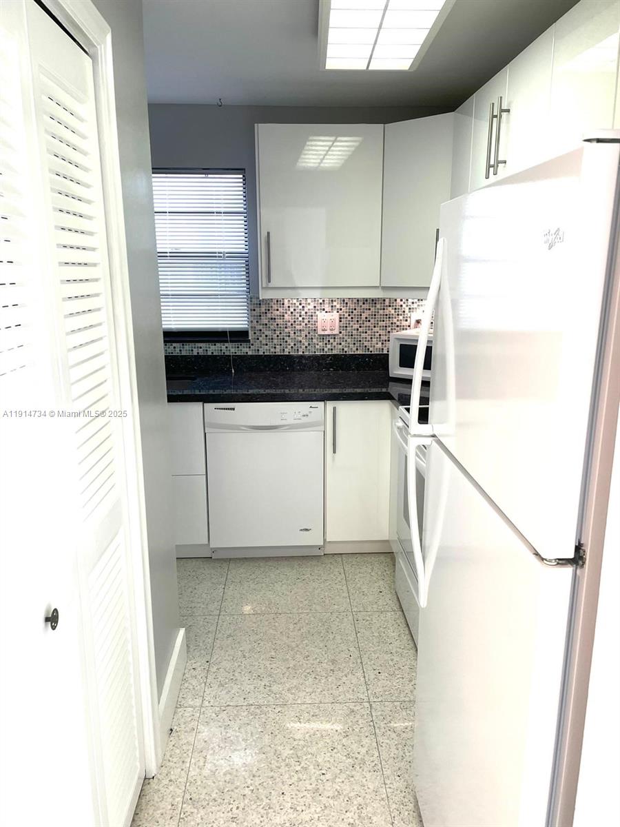 6424 COLLINS BLDG CONDO - Residential Lease