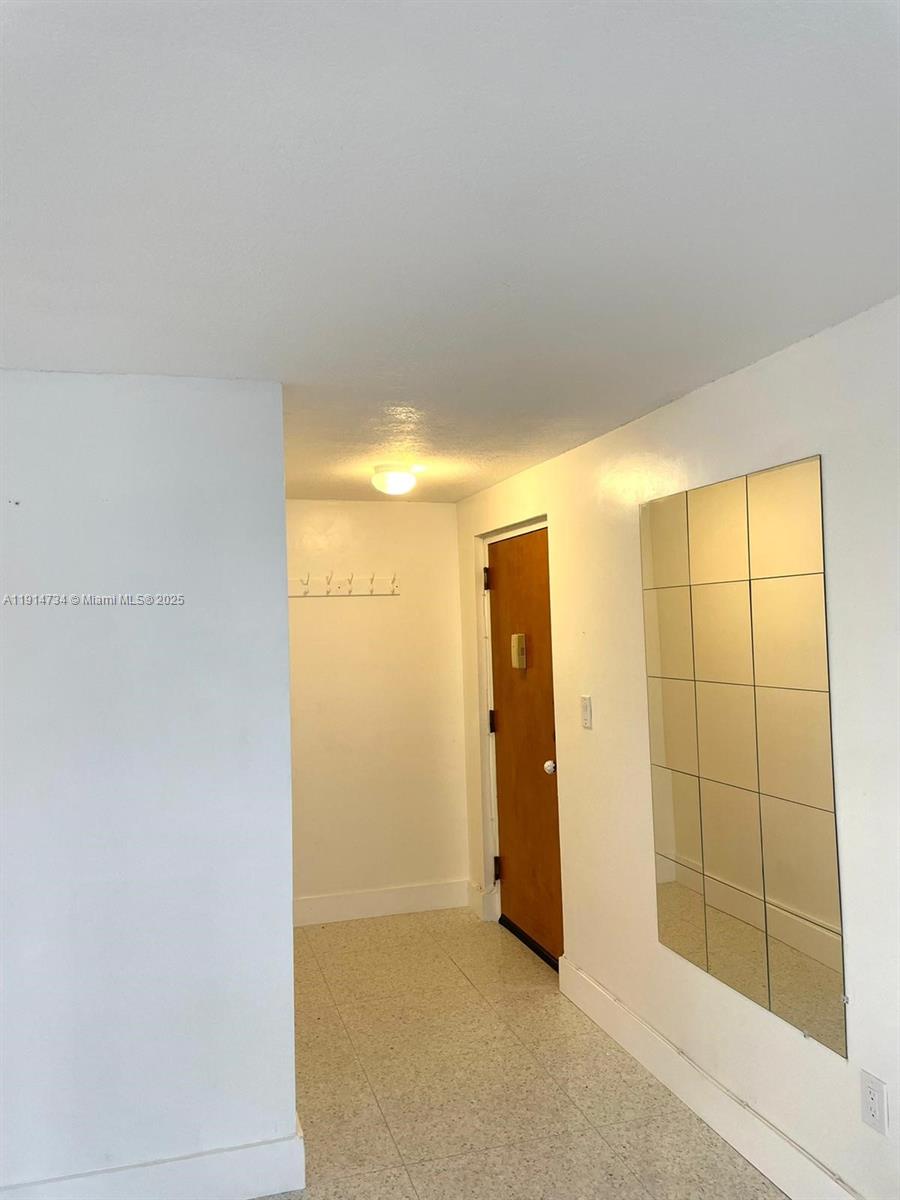 6424 COLLINS BLDG CONDO - Residential Lease