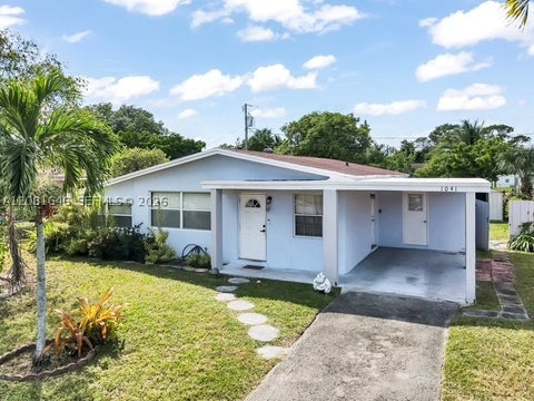 Photo of 1041 NW 24th Ter, Fort Lauderdale, FL 33311 (MLS # A12081646)