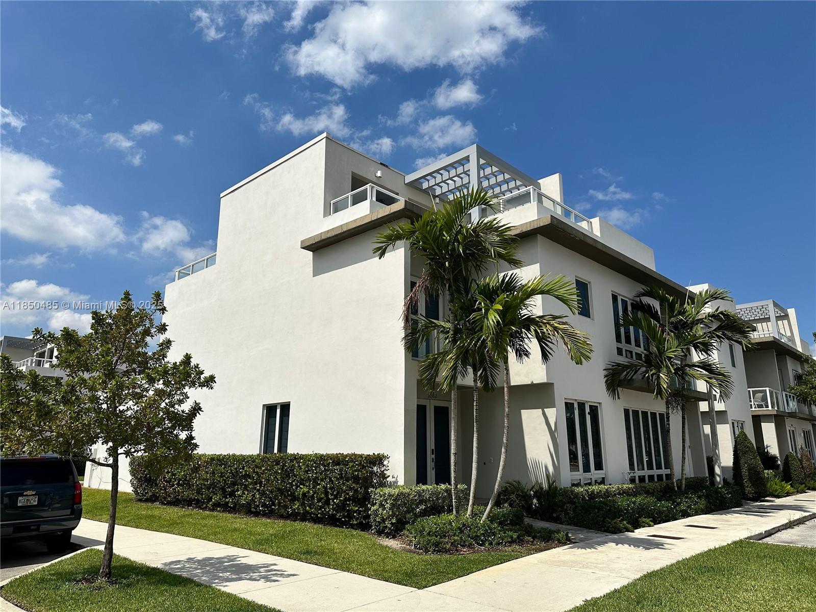 This 4-bedroom, 3.5-bath residence offers a sleek, open-concept design with natural light, high-impact windows and doors, and premium finishes throughout. The gourmet kitchen features quartz countertops, stainless steel appliances, and a spacious island perfect for dining or entertaining. A first-floor bedroom with a full bath provides flexibility for guests or a home office. Upstairs, the primary suite includes large closet and a large bathroom. The highlight is the expansive rooftop terrace, complete with an outdoor kitchen, ideal for social gatherings or relaxing with family. One-car garage plus two-car open driveway parking. Enjoy access to Landmark’s resort-style clubhouse, pool, fitness center, and more, all within minutes of top-rated schools, shopping, dining, and major highways.