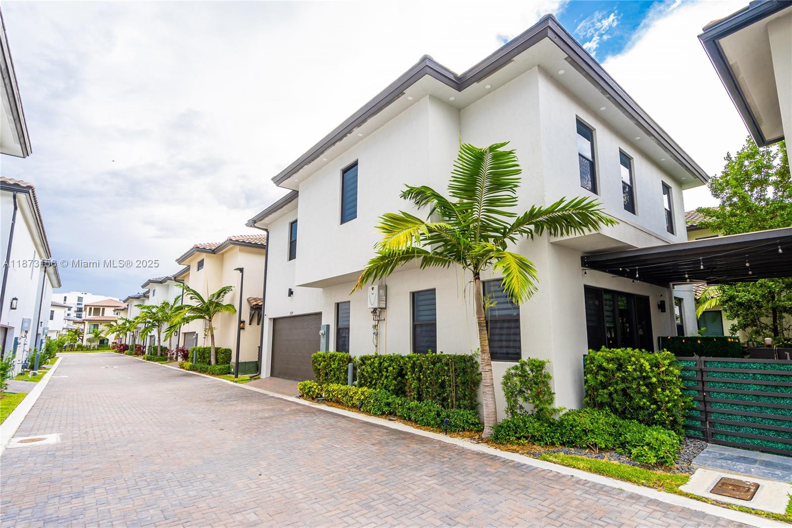 Exceptional chance to lease a beautifully upgraded single-family home in vibrant Downtown Doral—featuring a custom outdoor kitchen and wet bar on a spacious private terrace, perfect for entertaining in style. This elegant residence offers a modern layout with open living/dining areas, a sleek kitchen, and a convenient half bath on the first floor. Upstairs you’ll find 3 generously sized bedrooms, each with its own en-suite bathroom. Additional highlights include a custom 2-car garage with built-ins, LED lighting, and ample storage. Enjoy resort-style community amenities including a pool, gym, and green spaces—all just steps from top restaurants, shops, parks, and schools in the heart of Doral.