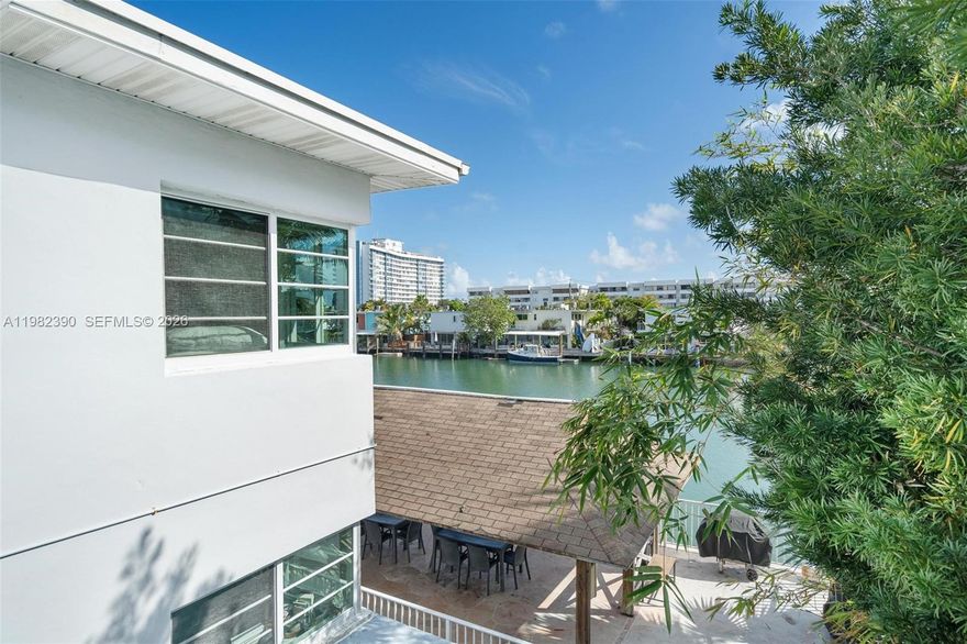 Beautiful corner unit on the second and top floor, in Normandy Isles, Miami Beach. Best location within the building, closest to the canal, with open water views of the Tatum Waterway from the living area and one bedroom. Only one neighboring unit, offering privacy, abundant natural light, and a true little paradise feeling!

The unit is in pristine condition and features central A/C replaced in 2021 with permit, impact windows and doors, beautiful hardwood floors, and an in-unit washer and dryer.

Boutique waterfront building with lush courtyards, pool, and BBQ area overlooking the canal.

Just a 10-minute walk from the beach, and close to the waterfront promenade, parks, restaurants, cafés, and shops. Minutes from Normandy Shores Golf Club and close to neighborhood upgrades including the 72nd Street Community Complex with library and aquatic center, plus new retail like Target and Publix coming soon.

A rare opportunity to own the best-located waterfront corner condo in Miami Beach. 2026 Approved budget and HOA fee include full reserves!! Unit does not come with a parking space => Street parking, The unit is sold furnished, with no value attributed to the furniture.