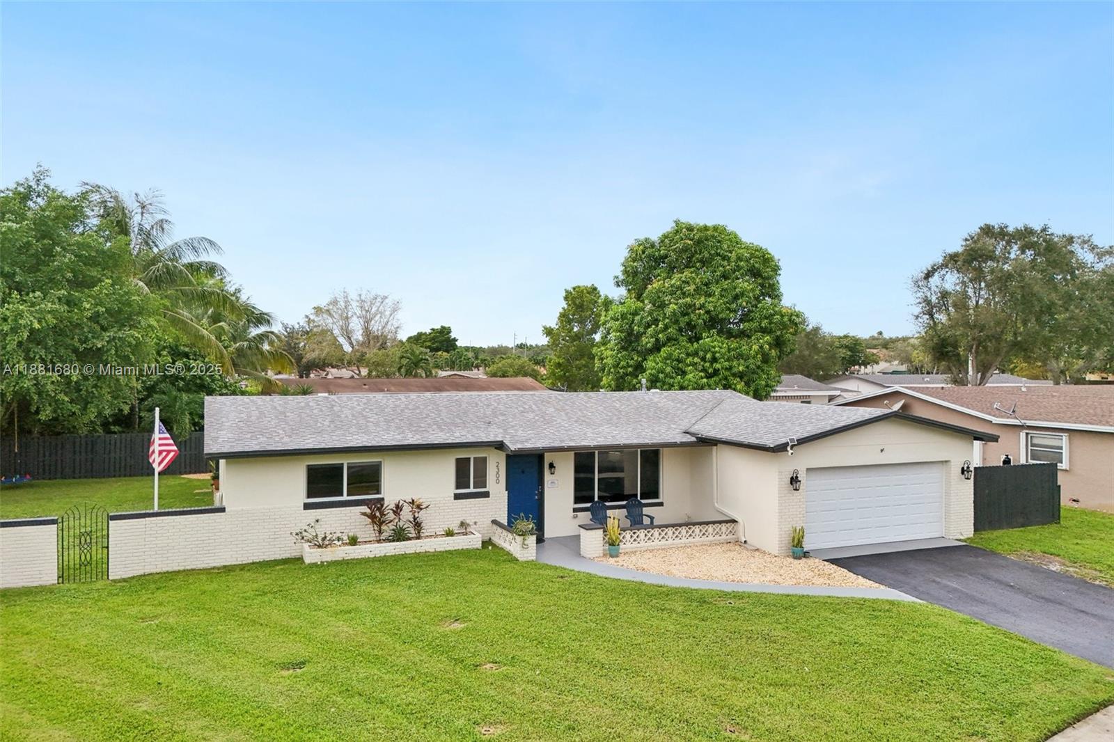 Welcome to this charming Pembroke Lakes home, tucked away on a quiet private loop. Move-in ready & meticulously cared for, it offers generous living space w/ a formal LR & separate family room. The spacious kitchen complements tastefully updated bathrooms, while laminate floors throughout, zebra shades, & new impact windows bring a modern touch. An oversized, air-conditioned laundry room provides abundant storage & garage access. The family room flows to a covered lanai w/travertine floors, perfect for entertaining & relaxing while enjoying serene lake views. The large fenced yard offers room for a pool. Upgrades include a 2018 roof, rain gutters, sprinkler system, gas water heater, & lanai gas hookup. Pembroke Lakes is a sought-after family community with no HOA & great schools!