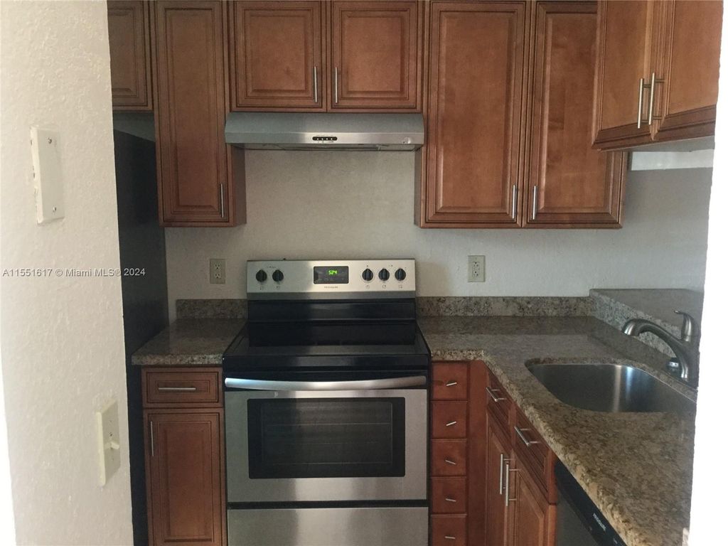 Photo of 4173 NW 114th Ave #4173, Coral Springs, FL 33065 (MLS # A11551617)