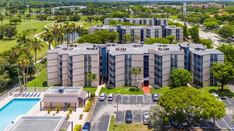 Photo of 7035 NW 186 St #D403, Hialeah, FL 33015 (MLS # A11630838)