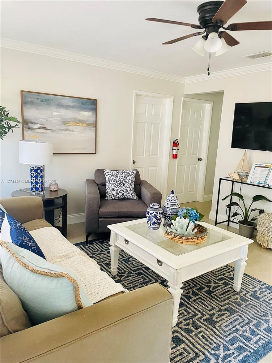 Bright and spacious 3bed 2 bath home, in a quiet and peaceful neighborhood only 3 miles from the beach! Owner is offering a seller contribution of 10K. New AC 2024, water heater installed in 2023, upgraded bathrooms, new 20" porcelain flooring,  newer reconfigured and oversized kitchen with stainless appliances, very spacious open floor plan on a great street with a huge back yard fully fenced. The entire home has accordion hurricane shutters for easy closure in the event of travel or hurricane season.