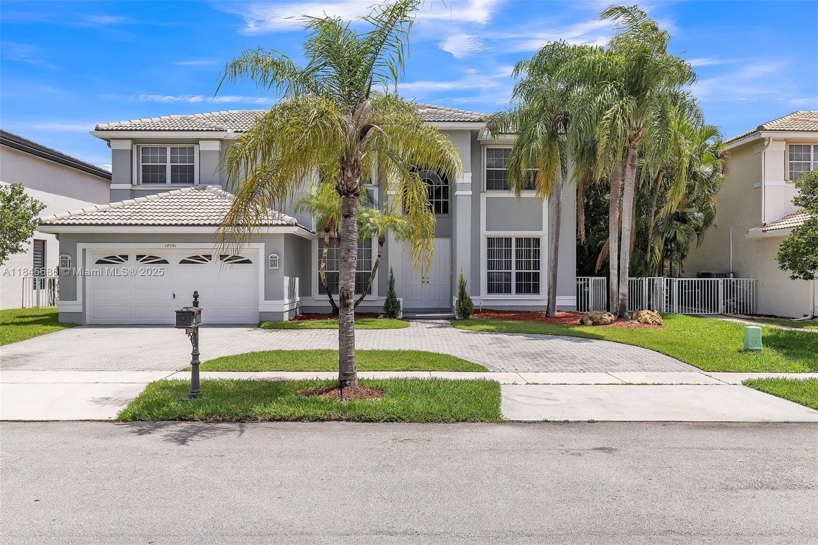 4 bedroom, 3 bathroom pool home with a stunning waterfront view, located in the exclusive gated community of Grand Cay at Silver Lakes in Miramar. The home features tile flooring on the main level and luxury vinyl plank upstairs. The kitchen is equipped with stainless steel appliances and updated cabinets, and it overlooks the pool and lake, offering a serene backdrop for everyday living. The highlight of the outdoor space is the pool and spa combo with picturesque views of the neighborhood lake. All bedrooms are located upstairs with generously sized closets. The primary suite includes a walk-in closet and a spacious en-suite bath with dual vanities, a separate tub, and a walk-in shower. Schedule a tour to discover the rest this home has to offer!
