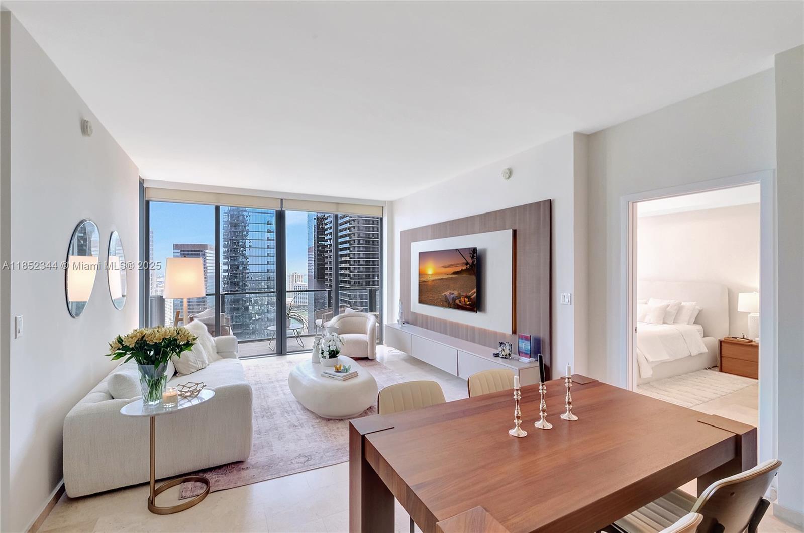 Elevated living at Rise at Brickell City Centre. This sleek 2-bedroom, 2.5-bath residence features marble floors, a high-end kitchen, custom closets, and stunning city-to-ocean views. With direct access to luxury shopping and dining, Rise offers resort-inspired amenities, pool, lush terraces, fitness center, spa, playroom, and a tranquil Hammam. This residence also includes parking for 2 vehicles. Effortless luxury in the heart of Brickell.