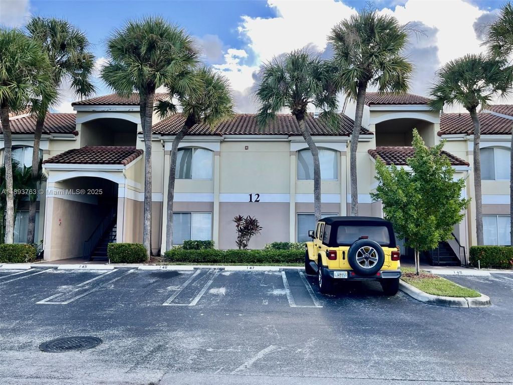 Photo of 815 W Boynton Beach Blvd #12-104, Boynton Beach, FL 33426 (MLS # A11893763)