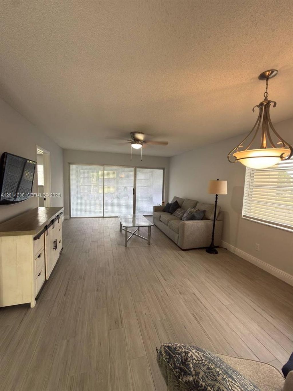 Photo of 6070 NW 64th Ave #312, Tamarac, FL 33319 (MLS # A12014238)