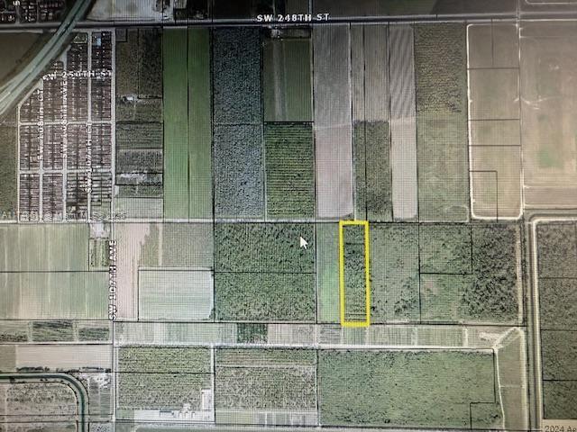Execellent Parcel approximately located sw 100th Ave SW 256 ST ST Near the exit of the Florida Turnpike This parcel is currently used as a Tree farm, tremendous potential for Future Single family homes or Townhomes. Great potential.