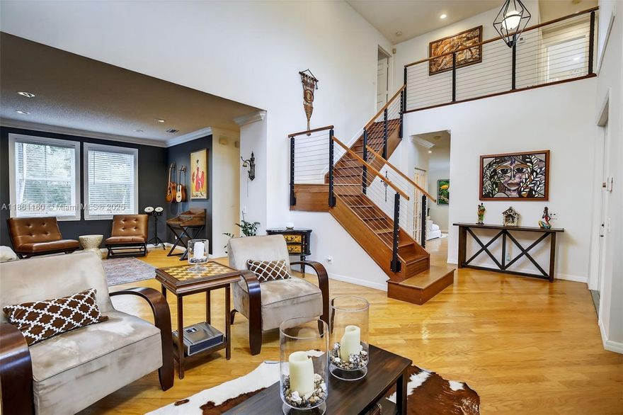 Discover your dream home on a quiet cul-de-sac! This stunning 4BR home impresses with soaring ceilings and a modern, open layout. The renovated gourmet kitchen is a chef's delight, featuring new stainless steel appliances, a custom breakfast bench, and a magnificent handcrafted wine cellar. Unwind in the expansive master suite, complete with a flex room and a spa-like renovated bath with a soaker tub.

Step outside into your private backyard oasis with a lush landscape, a heated saltwater pool, and a custom cooking station built for your Kamado-style grill (The Big Green Egg)—perfect for entertaining! An extended driveway offers ample guest parking. This meticulously updated home is the perfect blend of modern luxury and family comfort. Your Weston lifestyle awaits!