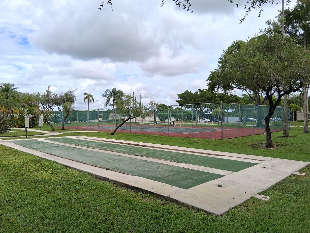 TAMARAC GARDENS CONDOMINI - Residential Lease