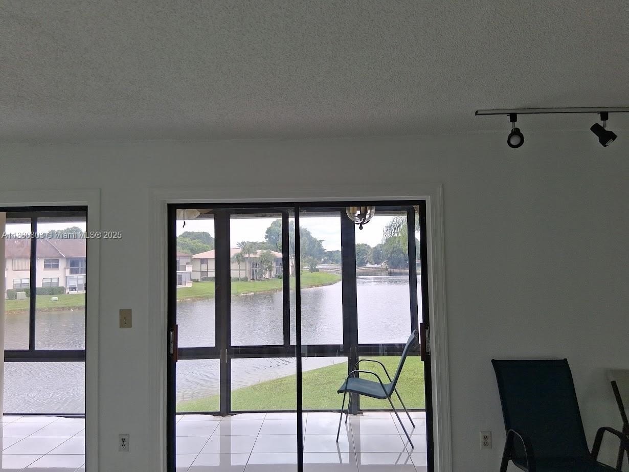 TAMARAC GARDENS CONDOMINI - Residential Lease