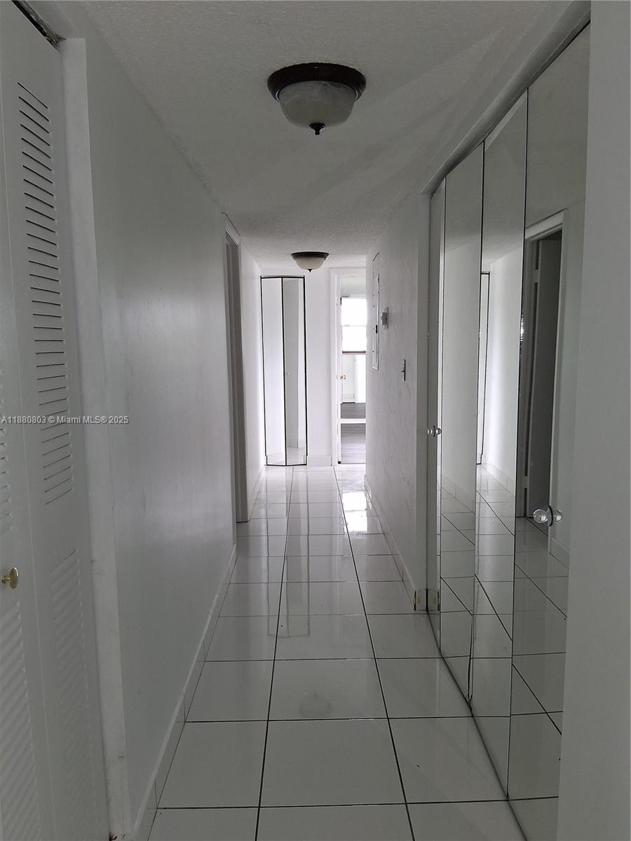 TAMARAC GARDENS CONDOMINI - Residential Lease